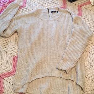Adorable knitted cream sweater back zip detail